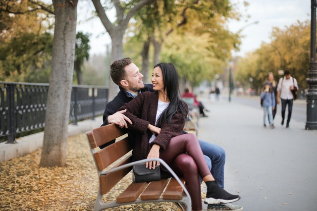 This image by Andrea Piacquadio shows a couple that sits on a bench in a park. It shows how important it is for highly sensitive people to achieve work-family balance.