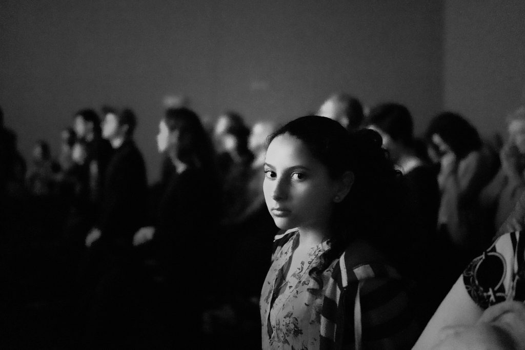 A picture of an empath dealing with the emotions of a crowd.